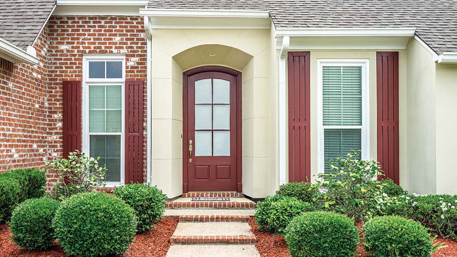 exterior of home with red entry door