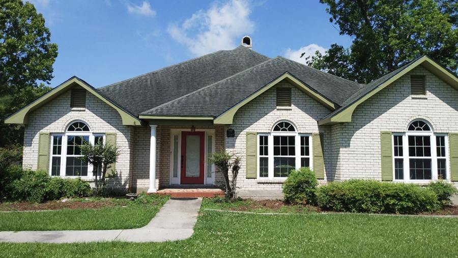 home with white custom double hung windows